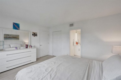 Bright and upgraded 2-bedroom 2-bath condo in a 55+ community on Oriole Golf and Tennis Club in Florida - for sale on GolfHomes.com, golf home, golf lot