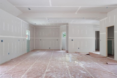 Tucked inside a gated golf community, this newly constructed on Ledgestone Country Club and Golf Course in Missouri - for sale on GolfHomes.com, golf home, golf lot