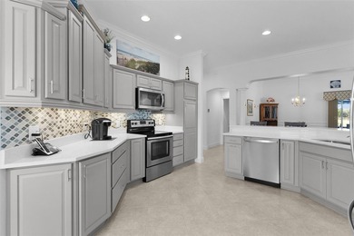 EXPANDED GARDENIA DESIGNER HOME with GOLF CAR GARAGE, LAKEFRONT on Pennbrooke Fairways in Florida - for sale on GolfHomes.com, golf home, golf lot