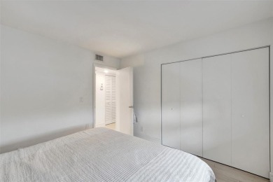 Bright and upgraded 2-bedroom 2-bath condo in a 55+ community on Oriole Golf and Tennis Club in Florida - for sale on GolfHomes.com, golf home, golf lot