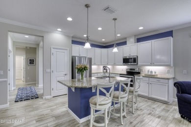 This one truly stands out from the rest! Nestled in the vibrant on LPGA International Golf Course in Florida - for sale on GolfHomes.com, golf home, golf lot