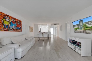 Bright and upgraded 2-bedroom 2-bath condo in a 55+ community on Oriole Golf and Tennis Club in Florida - for sale on GolfHomes.com, golf home, golf lot