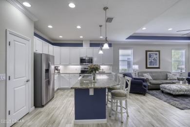 This one truly stands out from the rest! Nestled in the vibrant on LPGA International Golf Course in Florida - for sale on GolfHomes.com, golf home, golf lot