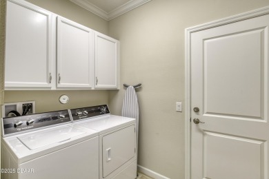 This one truly stands out from the rest! Nestled in the vibrant on LPGA International Golf Course in Florida - for sale on GolfHomes.com, golf home, golf lot