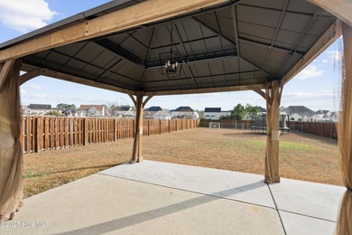 Welcome to your dream home on the fairways of the prestigious on Bear Trail Golf Club in North Carolina - for sale on GolfHomes.com, golf home, golf lot