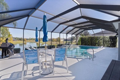 EXPANDED GARDENIA DESIGNER HOME with GOLF CAR GARAGE, LAKEFRONT on Pennbrooke Fairways in Florida - for sale on GolfHomes.com, golf home, golf lot