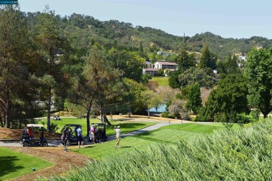 Indulge in beautiful views from the enclosed balcony of the on Rossmoor Golf Course in California - for sale on GolfHomes.com, golf home, golf lot