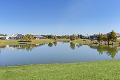 EXPANDED GARDENIA DESIGNER HOME with GOLF CAR GARAGE, LAKEFRONT on Pennbrooke Fairways in Florida - for sale on GolfHomes.com, golf home, golf lot