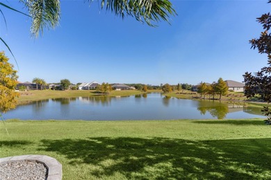 EXPANDED GARDENIA DESIGNER HOME with GOLF CAR GARAGE, LAKEFRONT on Pennbrooke Fairways in Florida - for sale on GolfHomes.com, golf home, golf lot