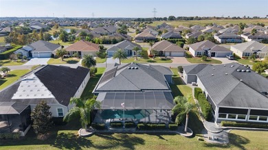 EXPANDED GARDENIA DESIGNER HOME with GOLF CAR GARAGE, LAKEFRONT on Pennbrooke Fairways in Florida - for sale on GolfHomes.com, golf home, golf lot