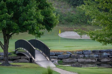 Tucked inside a gated golf community, this newly constructed on Ledgestone Country Club and Golf Course in Missouri - for sale on GolfHomes.com, golf home, golf lot