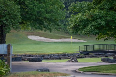 Tucked inside a gated golf community, this newly constructed on Ledgestone Country Club and Golf Course in Missouri - for sale on GolfHomes.com, golf home, golf lot