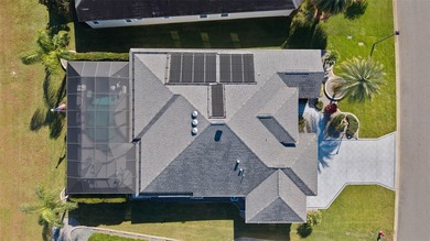 EXPANDED GARDENIA DESIGNER HOME with GOLF CAR GARAGE, LAKEFRONT on Pennbrooke Fairways in Florida - for sale on GolfHomes.com, golf home, golf lot