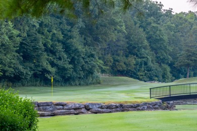 Tucked inside a gated golf community, this newly constructed on Ledgestone Country Club and Golf Course in Missouri - for sale on GolfHomes.com, golf home, golf lot