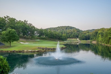 Tucked inside a gated golf community, this newly constructed on Ledgestone Country Club and Golf Course in Missouri - for sale on GolfHomes.com, golf home, golf lot