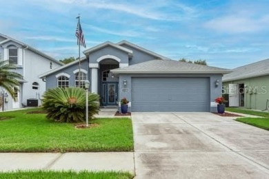 This immaculate home shows wonderfully and sits on one of the on River Ridge Golf Club in Florida - for sale on GolfHomes.com, golf home, golf lot