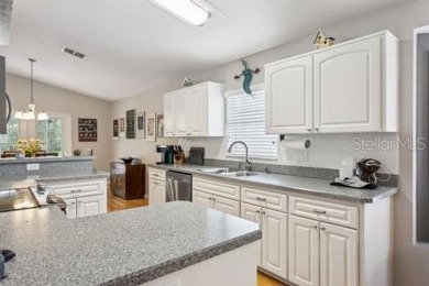 This immaculate home shows wonderfully and sits on one of the on River Ridge Golf Club in Florida - for sale on GolfHomes.com, golf home, golf lot