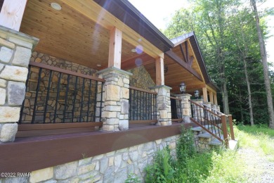 Step into this masterfully renovated contemporary home that on The Hideout Golf in Pennsylvania - for sale on GolfHomes.com, golf home, golf lot