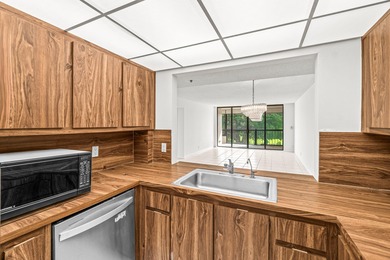 Discover this beautifully located condo in the highly on The Country Club At Boca Raton in Florida - for sale on GolfHomes.com, golf home, golf lot