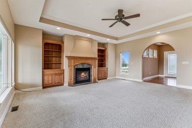 Situated on hole #4 at River Ridge Golf Course, this stunning on River Ridge Golf Club in Iowa - for sale on GolfHomes.com, golf home, golf lot