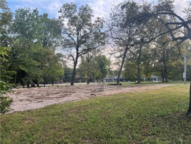 Exceptional Second-tier Lot in the private lake community of on Sugar Valley Lakes Golf Course in Kansas - for sale on GolfHomes.com, golf home, golf lot