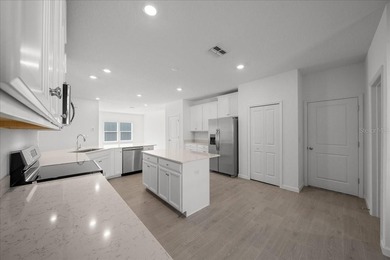 Never lived in and perfectly positioned, this stunning Tivoli on Candler Hills Golf and Country Club in Florida - for sale on GolfHomes.com, golf home, golf lot