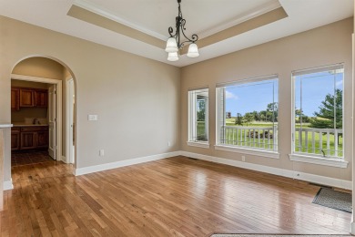 Situated on hole #4 at River Ridge Golf Course, this stunning on River Ridge Golf Club in Iowa - for sale on GolfHomes.com, golf home, golf lot