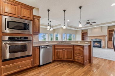 Situated on hole #4 at River Ridge Golf Course, this stunning on River Ridge Golf Club in Iowa - for sale on GolfHomes.com, golf home, golf lot