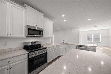 Never lived in and perfectly positioned, this stunning Tivoli on Candler Hills Golf and Country Club in Florida - for sale on GolfHomes.com, golf home, golf lot