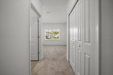 Never lived in and perfectly positioned, this stunning Tivoli on Candler Hills Golf and Country Club in Florida - for sale on GolfHomes.com, golf home, golf lot