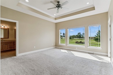 Situated on hole #4 at River Ridge Golf Course, this stunning on River Ridge Golf Club in Iowa - for sale on GolfHomes.com, golf home, golf lot