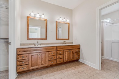 Situated on hole #4 at River Ridge Golf Course, this stunning on River Ridge Golf Club in Iowa - for sale on GolfHomes.com, golf home, golf lot