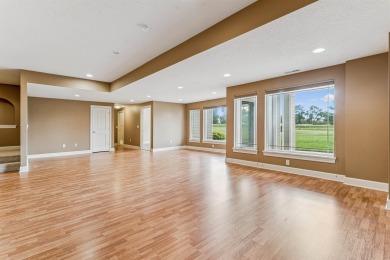 Situated on hole #4 at River Ridge Golf Course, this stunning on River Ridge Golf Club in Iowa - for sale on GolfHomes.com, golf home, golf lot