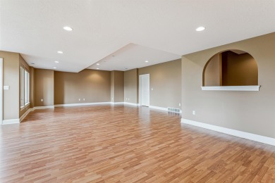 Situated on hole #4 at River Ridge Golf Course, this stunning on River Ridge Golf Club in Iowa - for sale on GolfHomes.com, golf home, golf lot