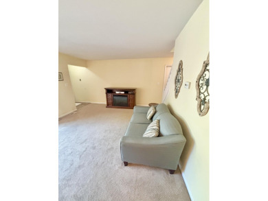 2 story, 2 bed, 1.5 bath townhouse condo with basement and on Plum Brook Golf Club in Michigan - for sale on GolfHomes.com, golf home, golf lot