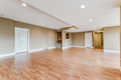 Situated on hole #4 at River Ridge Golf Course, this stunning on River Ridge Golf Club in Iowa - for sale on GolfHomes.com, golf home, golf lot