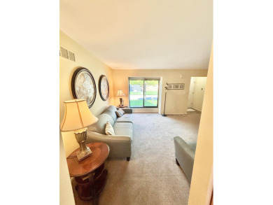 2 story, 2 bed, 1.5 bath townhouse condo with basement and on Plum Brook Golf Club in Michigan - for sale on GolfHomes.com, golf home, golf lot