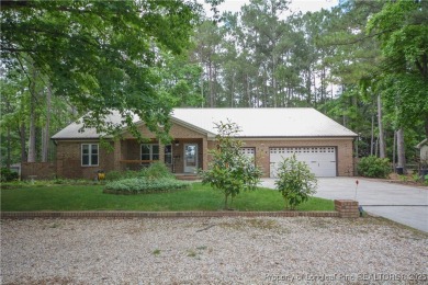 Gorgeous new listing in the gated community of Carolina Lakes on Carolina Lakes Country Club in North Carolina - for sale on GolfHomes.com, golf home, golf lot