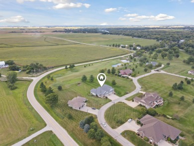 Situated on hole #4 at River Ridge Golf Course, this stunning on River Ridge Golf Club in Iowa - for sale on GolfHomes.com, golf home, golf lot