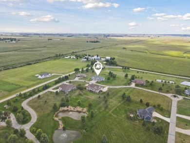 Situated on hole #4 at River Ridge Golf Course, this stunning on River Ridge Golf Club in Iowa - for sale on GolfHomes.com, golf home, golf lot
