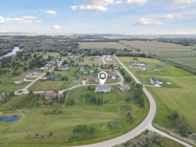 Situated on hole #4 at River Ridge Golf Course, this stunning on River Ridge Golf Club in Iowa - for sale on GolfHomes.com, golf home, golf lot