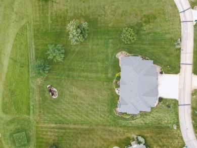 Situated on hole #4 at River Ridge Golf Course, this stunning on River Ridge Golf Club in Iowa - for sale on GolfHomes.com, golf home, golf lot