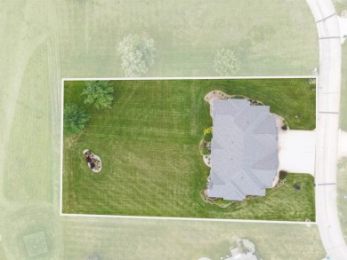 Situated on hole #4 at River Ridge Golf Course, this stunning on River Ridge Golf Club in Iowa - for sale on GolfHomes.com, golf home, golf lot
