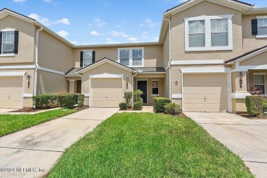 This condo features two bedrooms each with their own private on Golf Club At Fleming Island in Florida - for sale on GolfHomes.com, golf home, golf lot