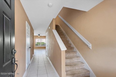 This condo features two bedrooms each with their own private on Golf Club At Fleming Island in Florida - for sale on GolfHomes.com, golf home, golf lot