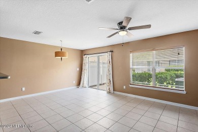 This condo features two bedrooms each with their own private on Golf Club At Fleming Island in Florida - for sale on GolfHomes.com, golf home, golf lot