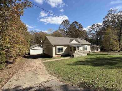 Experience the relaxed Ozark lifestyle just minutes from the on Cherokee Village North Course in Arkansas - for sale on GolfHomes.com, golf home, golf lot