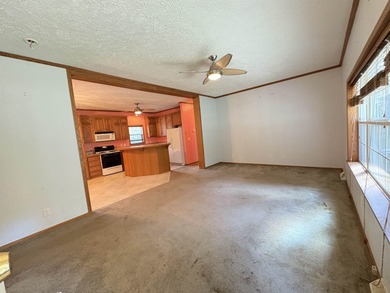 Experience the relaxed Ozark lifestyle just minutes from the on Cherokee Village North Course in Arkansas - for sale on GolfHomes.com, golf home, golf lot