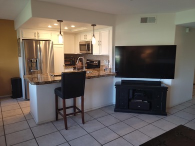 Experience dramatic lake, fairway, and San Bernardino Mountain on Palm Royale Country Club in California - for sale on GolfHomes.com, golf home, golf lot