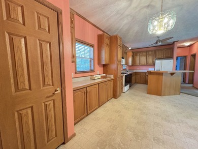 Experience the relaxed Ozark lifestyle just minutes from the on Cherokee Village North Course in Arkansas - for sale on GolfHomes.com, golf home, golf lot